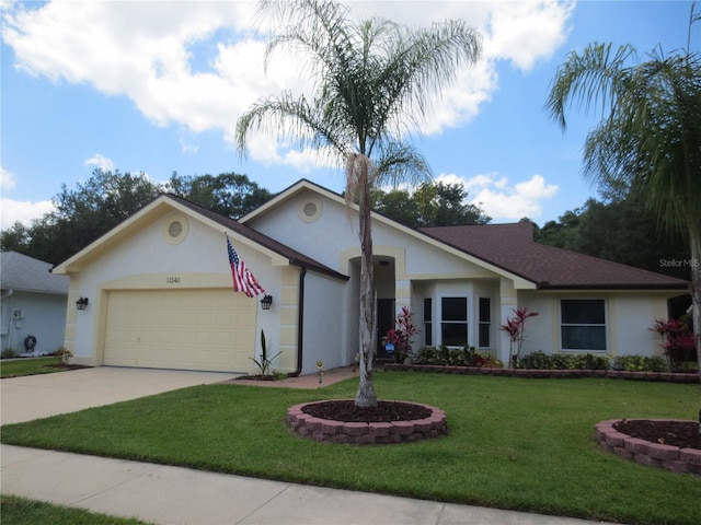 single story home with a garage and a front lawn