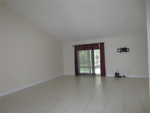 empty room featuring light tile patterned floors