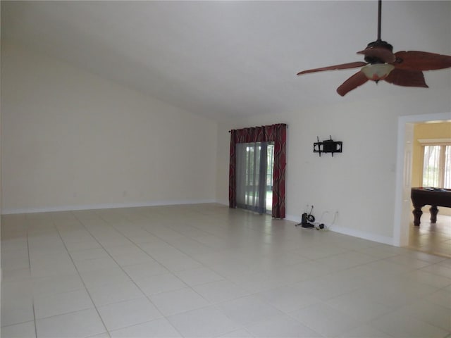 tiled spare room with ceiling fan and pool table