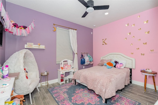 bedroom featuring ceiling fan and wood-type flooring