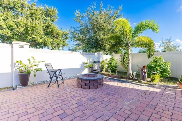 view of patio / terrace featuring a fire pit