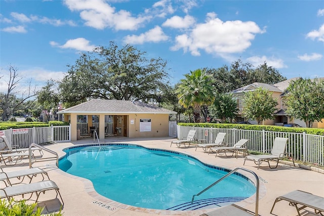 view of swimming pool featuring a patio