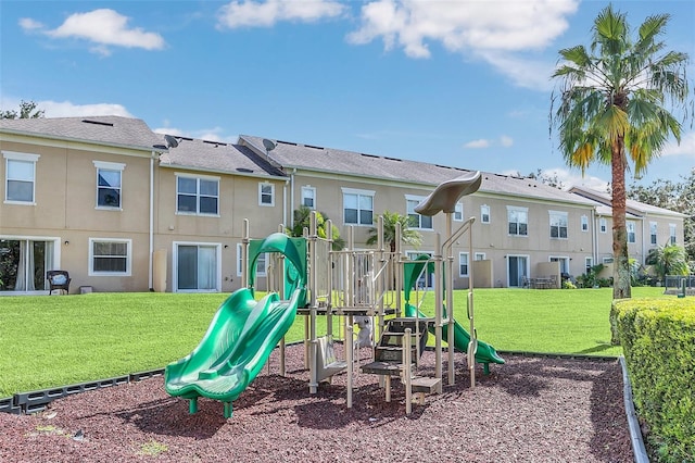 view of jungle gym with a yard