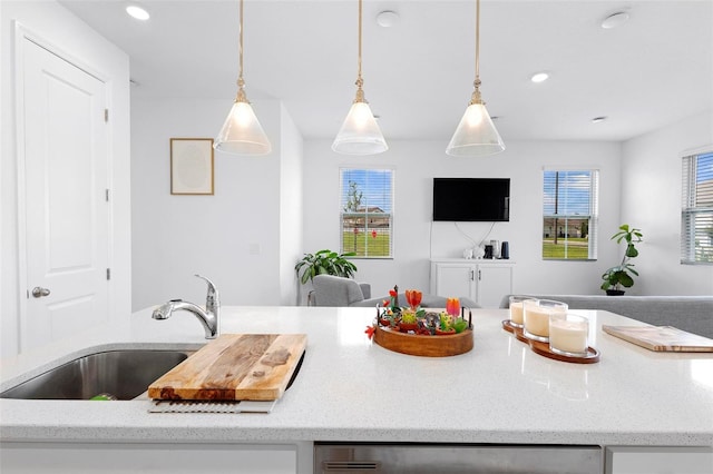 kitchen with sink and pendant lighting