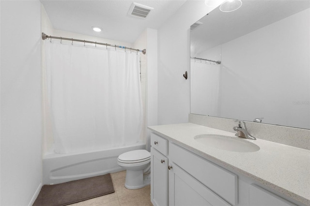 full bathroom with shower / bathtub combination with curtain, tile patterned flooring, vanity, and toilet