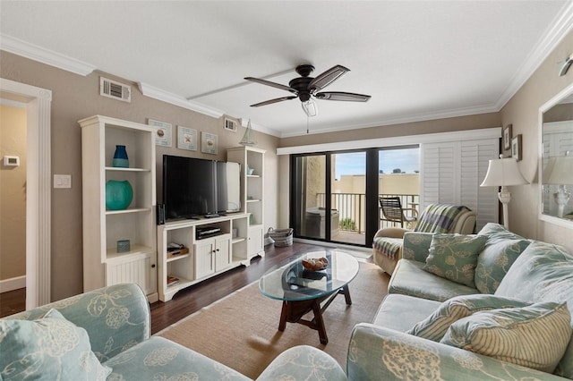 living room with ceiling fan, dark wood-type flooring, and crown molding