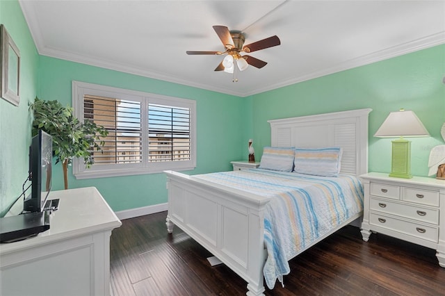 bedroom featuring ornamental molding, dark hardwood / wood-style floors, and ceiling fan