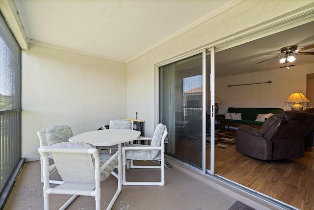 balcony featuring ceiling fan