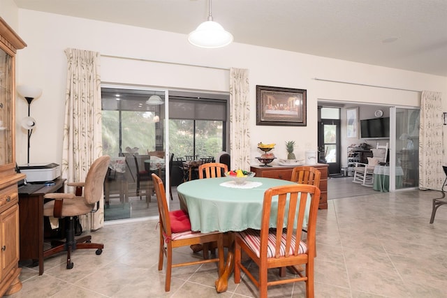 dining room featuring light tile patterned floors