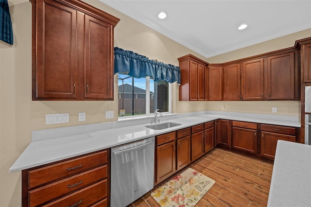 kitchen featuring light hardwood / wood-style flooring, dishwasher, ornamental molding, and sink