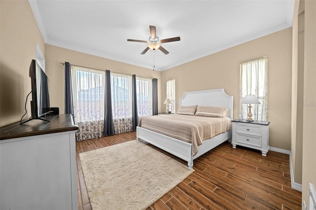 bedroom featuring ceiling fan, crown molding, and dark hardwood / wood-style flooring