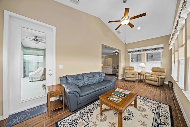 living room featuring wood-type flooring, lofted ceiling, and ceiling fan