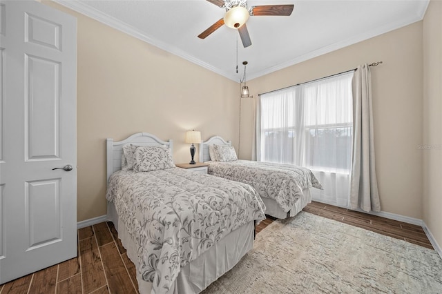 bedroom featuring crown molding, dark hardwood / wood-style floors, and ceiling fan