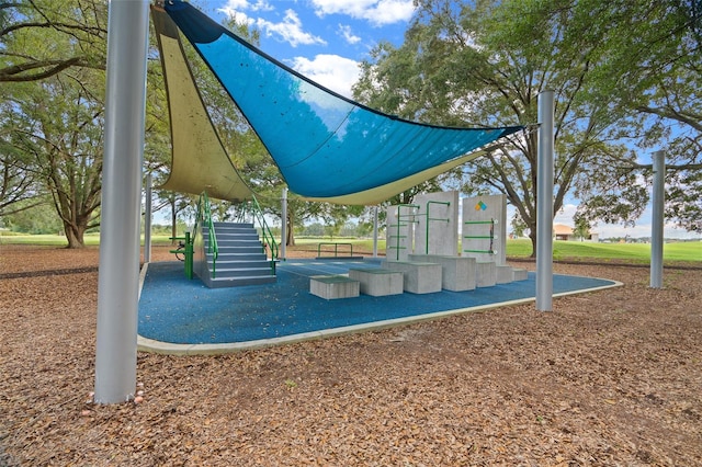 view of property's community featuring a playground