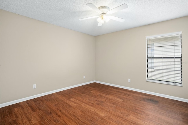 unfurnished room with a textured ceiling, wood-type flooring, and ceiling fan