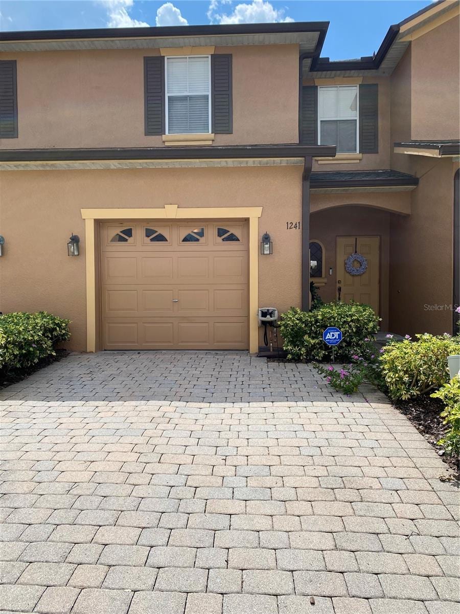 view of front of property featuring a garage