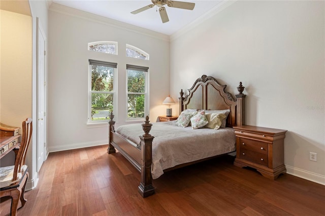 bedroom with ornamental molding, multiple windows, ceiling fan, and dark hardwood / wood-style floors