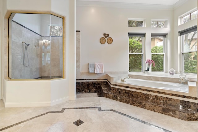 bathroom with plus walk in shower and ornamental molding