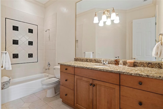 full bathroom with tile patterned flooring, crown molding, vanity, tiled shower / bath, and toilet