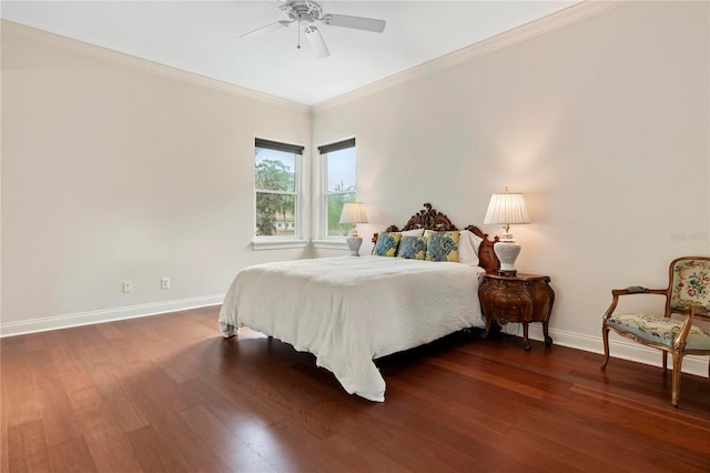 bedroom featuring ceiling fan, ornamental molding, and dark hardwood / wood-style flooring