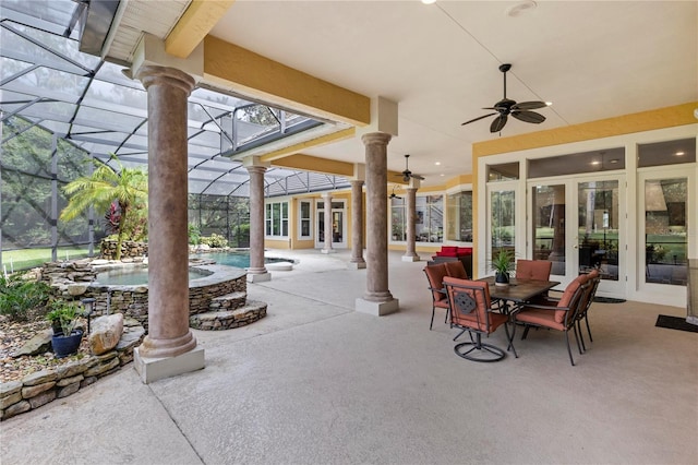 view of patio featuring glass enclosure, ceiling fan, french doors, and a pool with hot tub