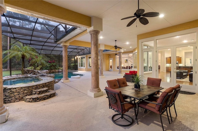 view of patio with ceiling fan, a pool with hot tub, french doors, and glass enclosure