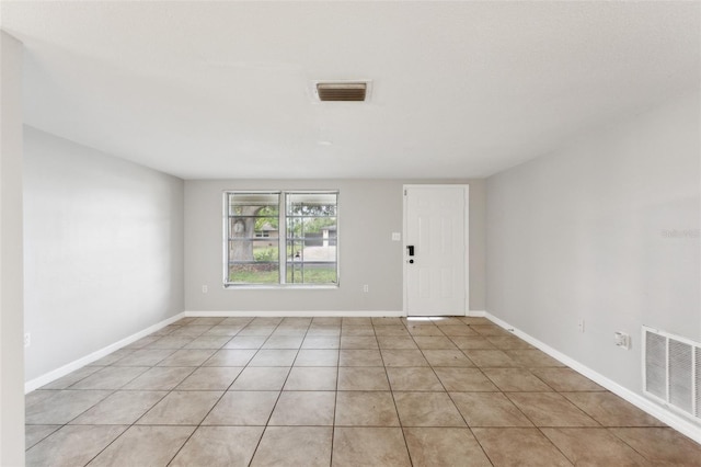 view of tiled spare room