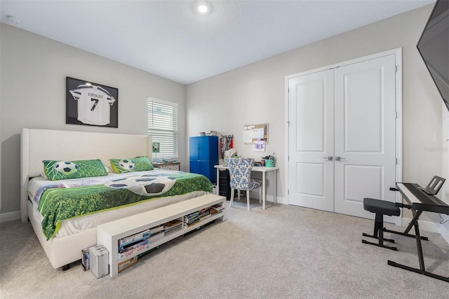 bedroom featuring a closet and carpet floors