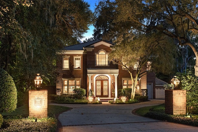 view of front of property with a garage