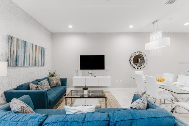 living room with light tile patterned floors