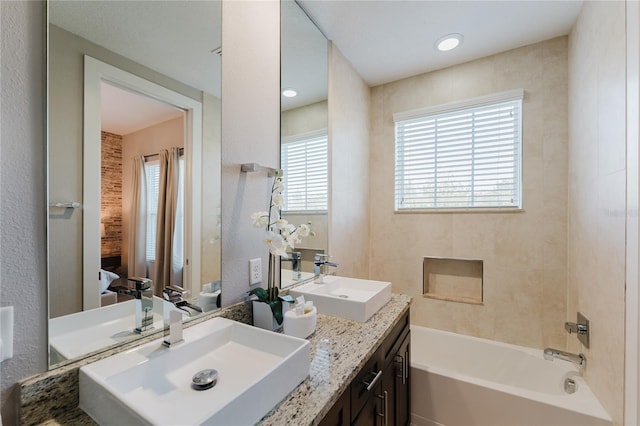 bathroom featuring vanity and plenty of natural light