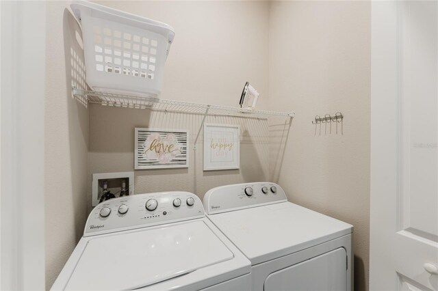 laundry area featuring independent washer and dryer