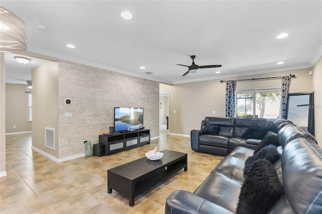 tiled living room with ceiling fan and crown molding