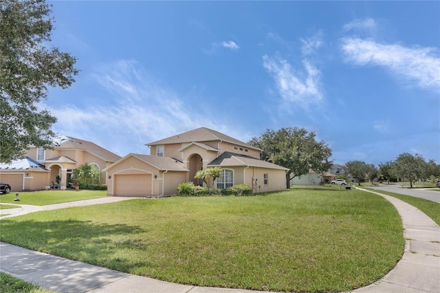 mediterranean / spanish-style home featuring a garage and a front lawn