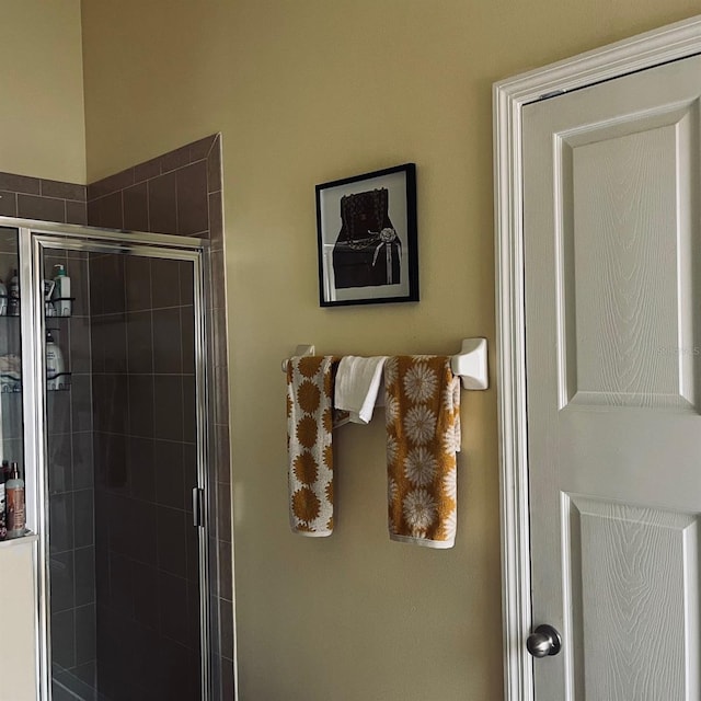 bathroom featuring an enclosed shower