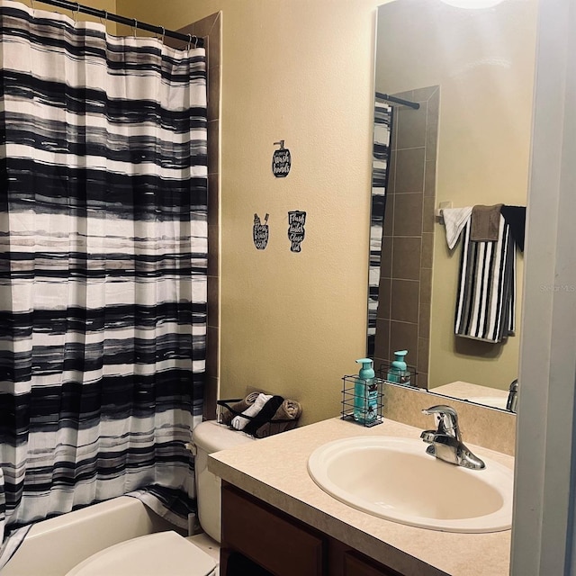 full bathroom featuring vanity, toilet, and shower / bath combo