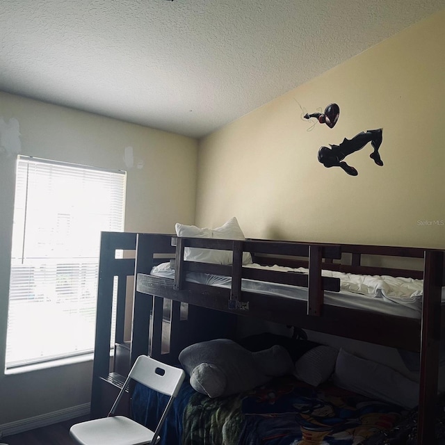 bedroom with a textured ceiling