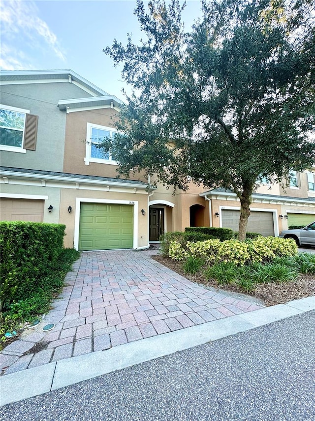 view of front of property with a garage