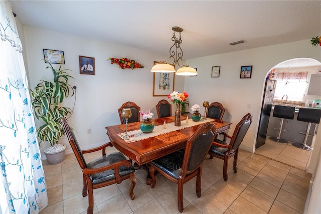 view of tiled dining space