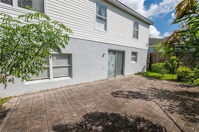 back of house featuring a patio area