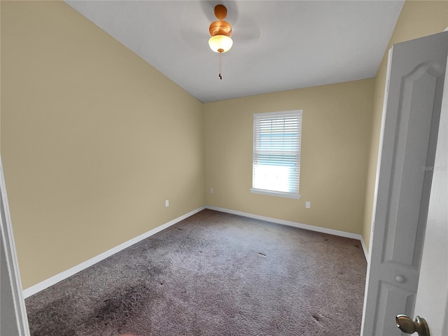 spare room with carpet flooring and ceiling fan