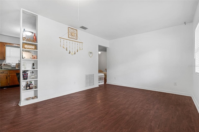 living room featuring dark hardwood / wood-style floors