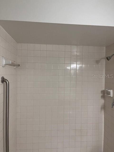 details with a tile shower