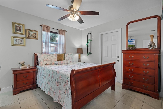 bedroom featuring light tile patterned floors and ceiling fan