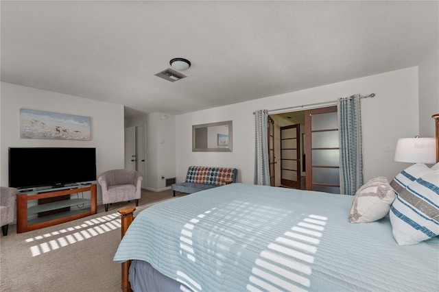 bedroom featuring carpet