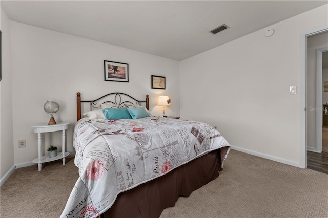 bedroom featuring carpet