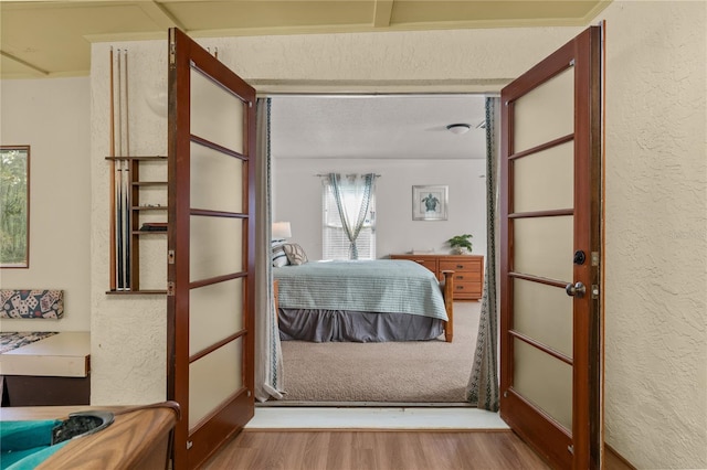 bedroom featuring light hardwood / wood-style floors