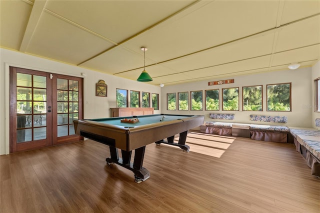 playroom featuring french doors, pool table, and hardwood / wood-style floors