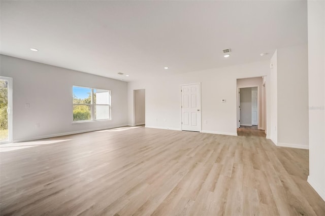 spare room with light wood-type flooring