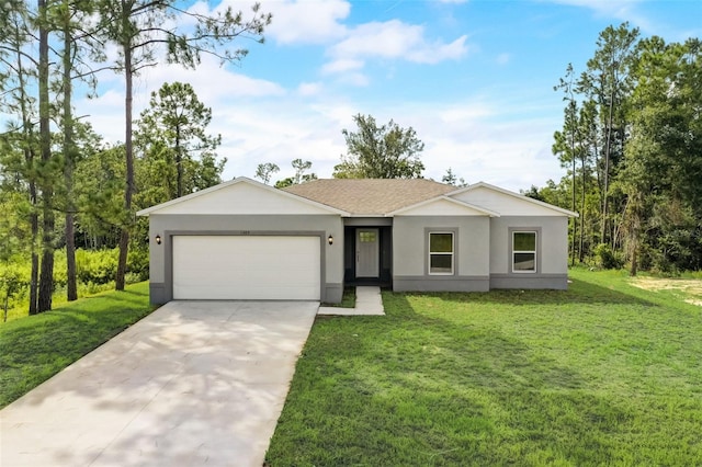 ranch-style house featuring a front yard and a garage